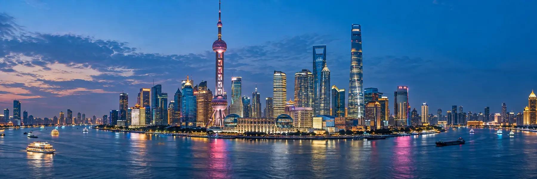 Shanghai skyline above the Huangpu River at blue hour