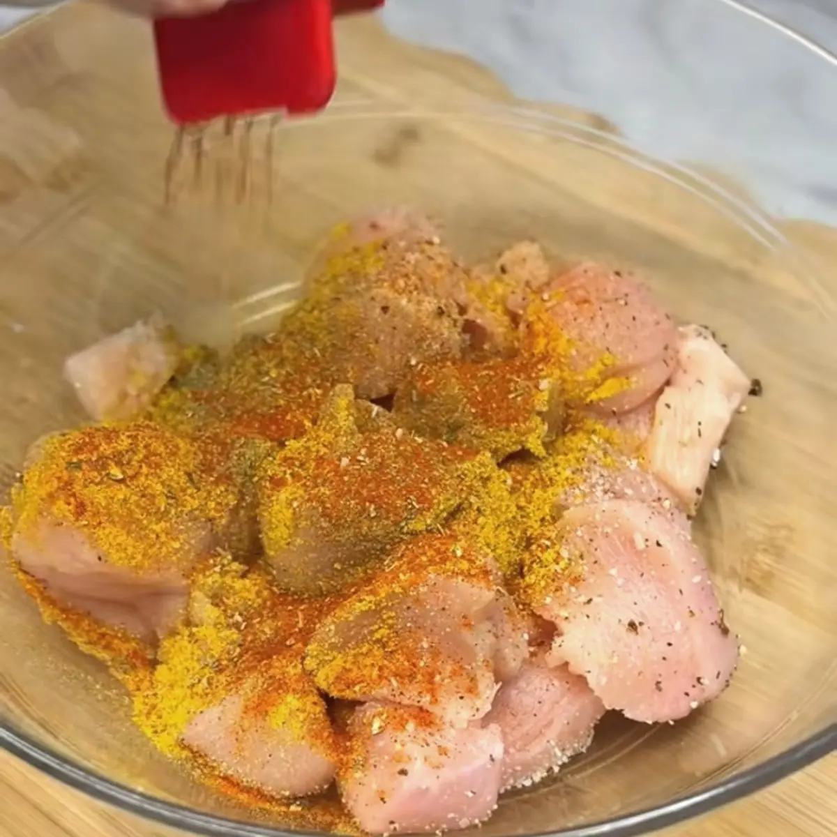 Preparation step for Smothered Coconut Curry Chicken.