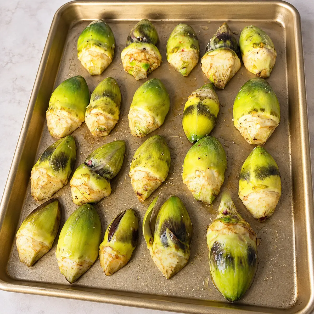 Preparation step for Roasted Korean Parmesan Artichokes.