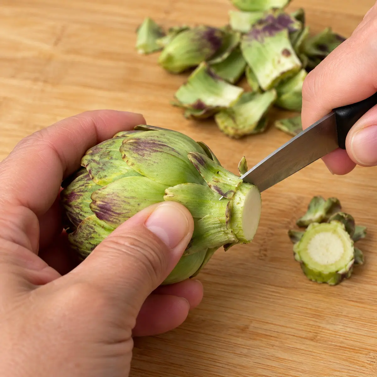 Preparation step for Roasted Korean Parmesan Artichokes.